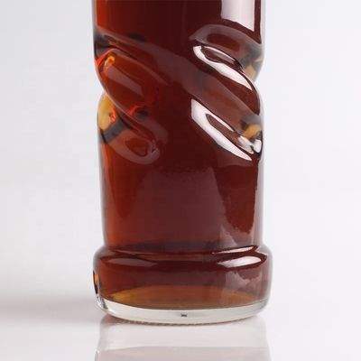 2022 Botella de vidrio de fondo grueso en relieve de piedra clara para ginebra whisky ron tequila brandy