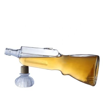 Botella de vidrio de whisky de 500 ml Con forma de pistola, molde abierto Botella de vodka de 700 ml para la industria de bebidas