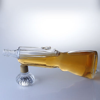 Botella de vidrio de whisky de 500 ml Con forma de pistola, molde abierto Botella de vodka de 700 ml para la industria de bebidas