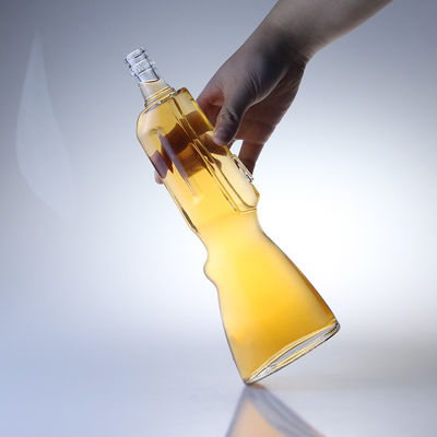 Botella de vidrio de whisky de 500 ml Con forma de pistola, molde abierto Botella de vodka de 700 ml para la industria de bebidas