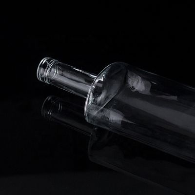 Botellas de vidrio de 1750 ml 1000 ml para licor personalizado Botella redonda de vodka Uso versátil