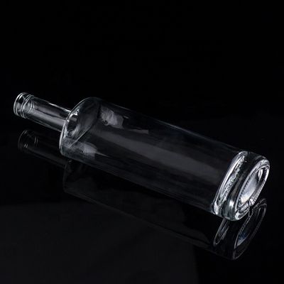 Botellas de vidrio de 1750 ml 1000 ml para licor personalizado Botella redonda de vodka Uso versátil